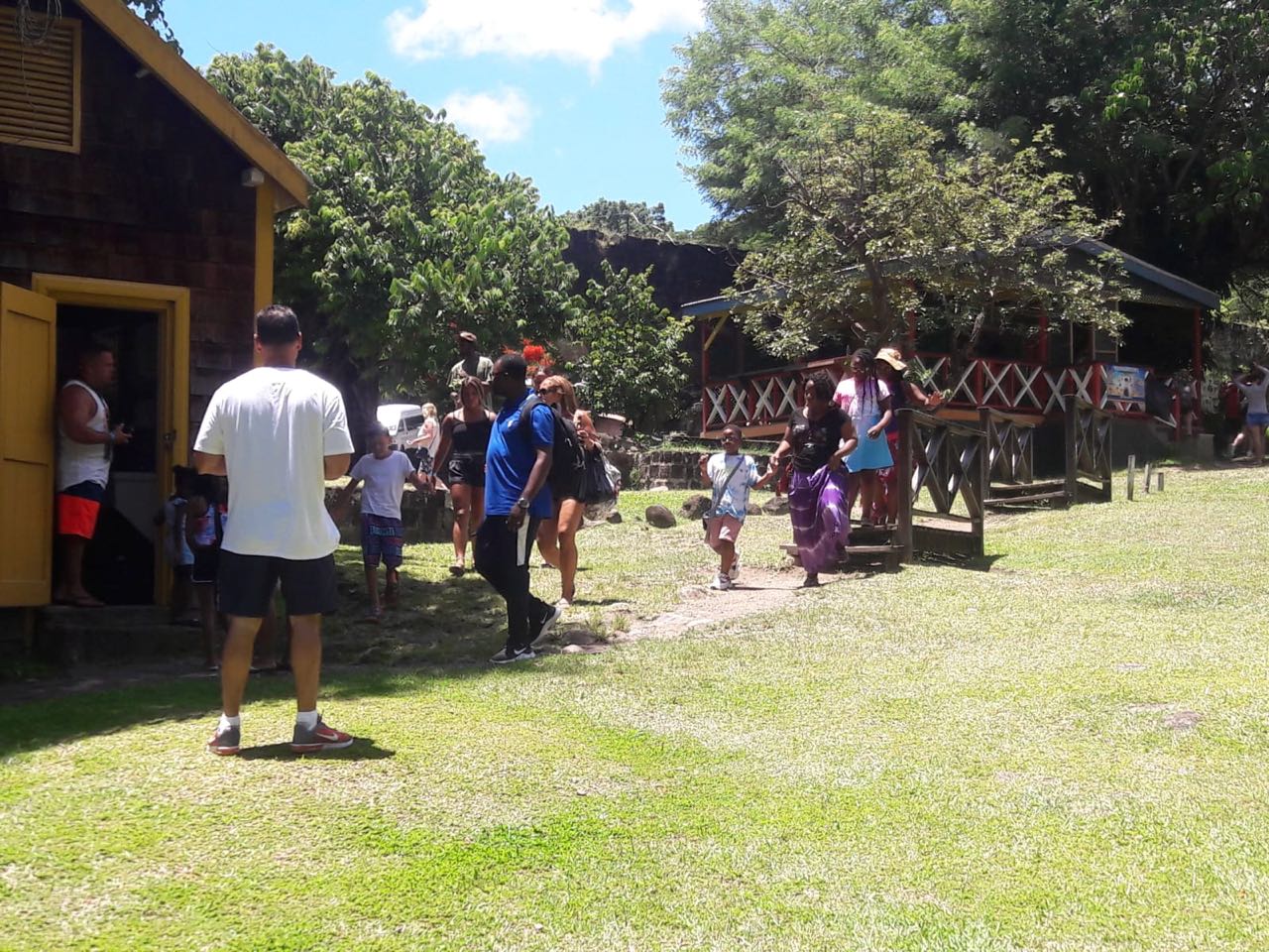 Tourists exploring the Old Bay Rum Distillery